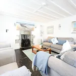 The Boathouse On The Atlantic Sea