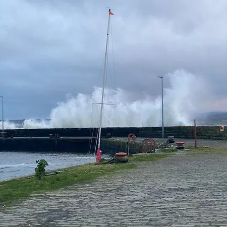 The Boathouse On The Atlantic Sea *