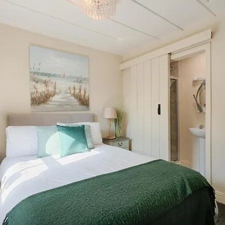 The Boathouse On The Atlantic Sea